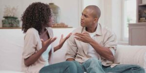 Couple in argument on couch